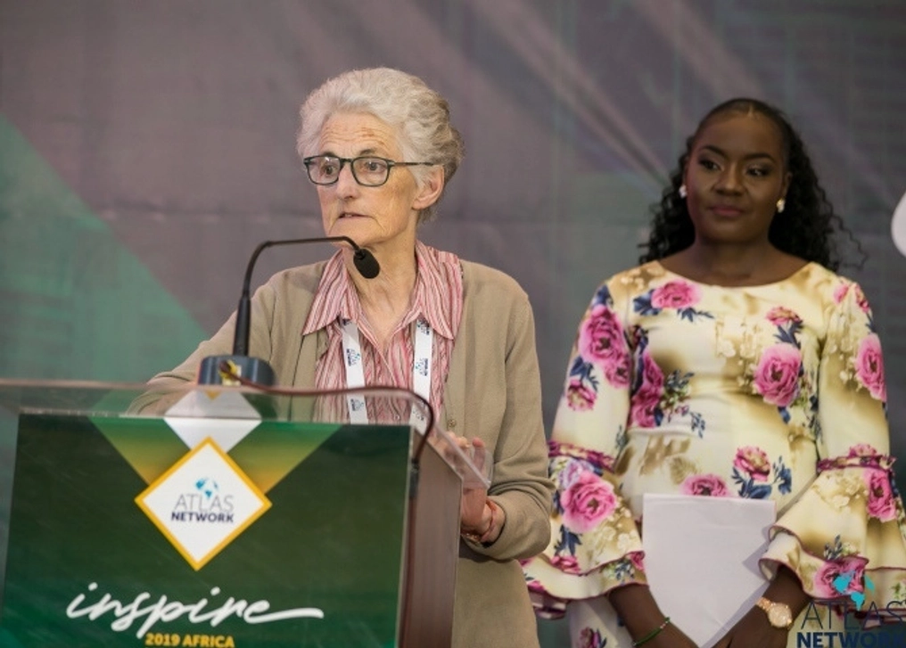 A elderly woman gives a speech at the Africa Liberty Forum.