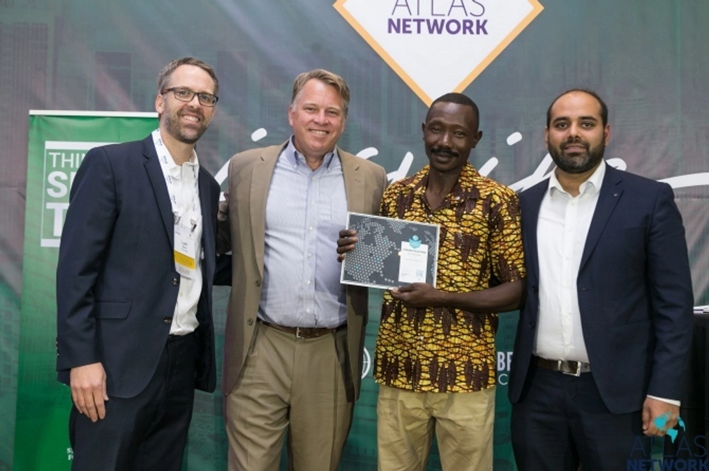 Atlas Network CEO Brad Lips poses with three men at the Africa Liberty Forum.
