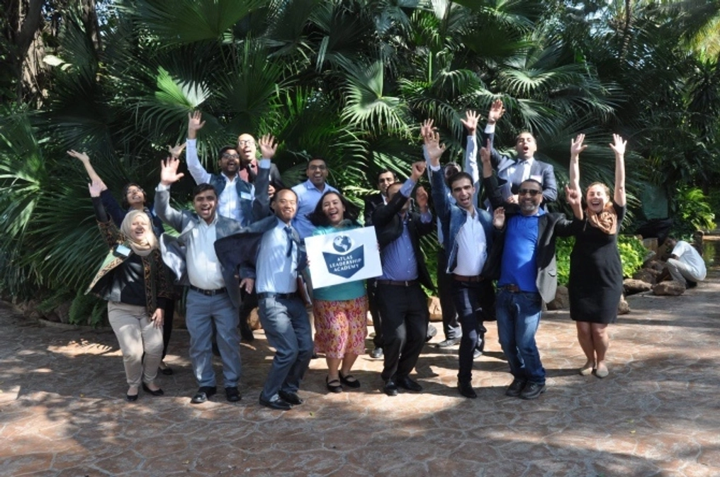 A group poses outdoors for a photo at the Asia Liberty Forum.