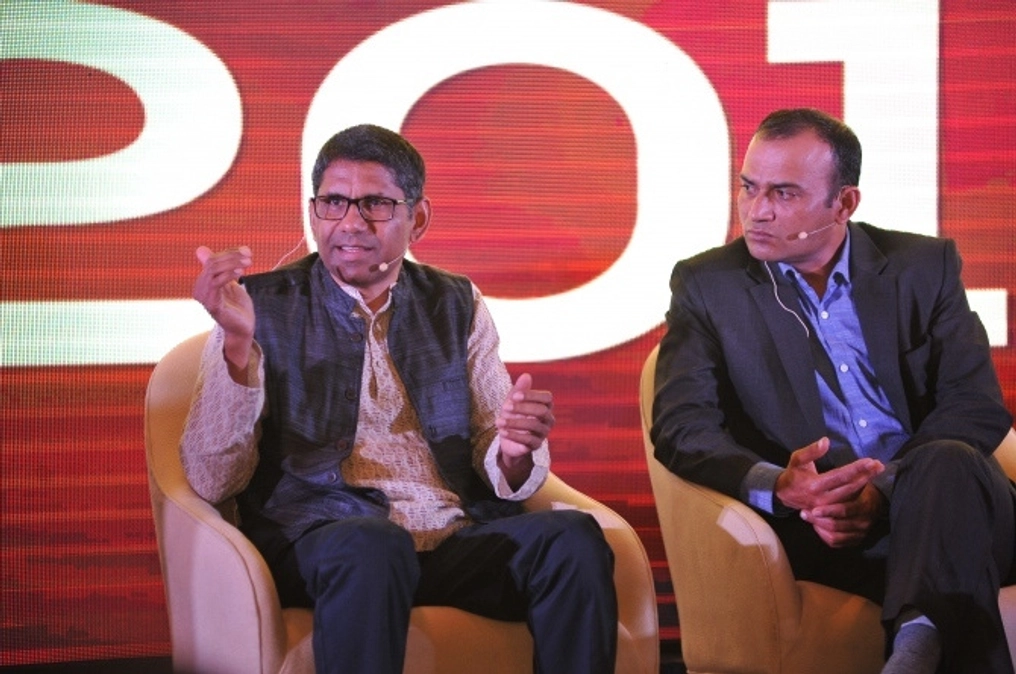 Shah  on stage speaking at the 2018 Asia Liberty Forum.