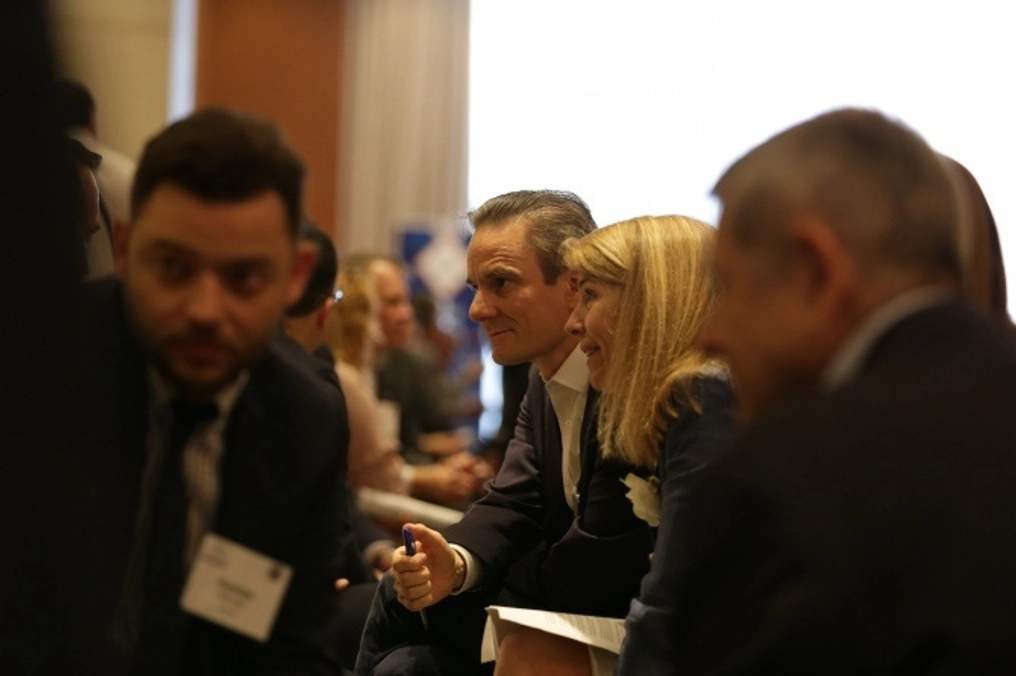 The crowd watches intently at the Think Tank Shark Tank.