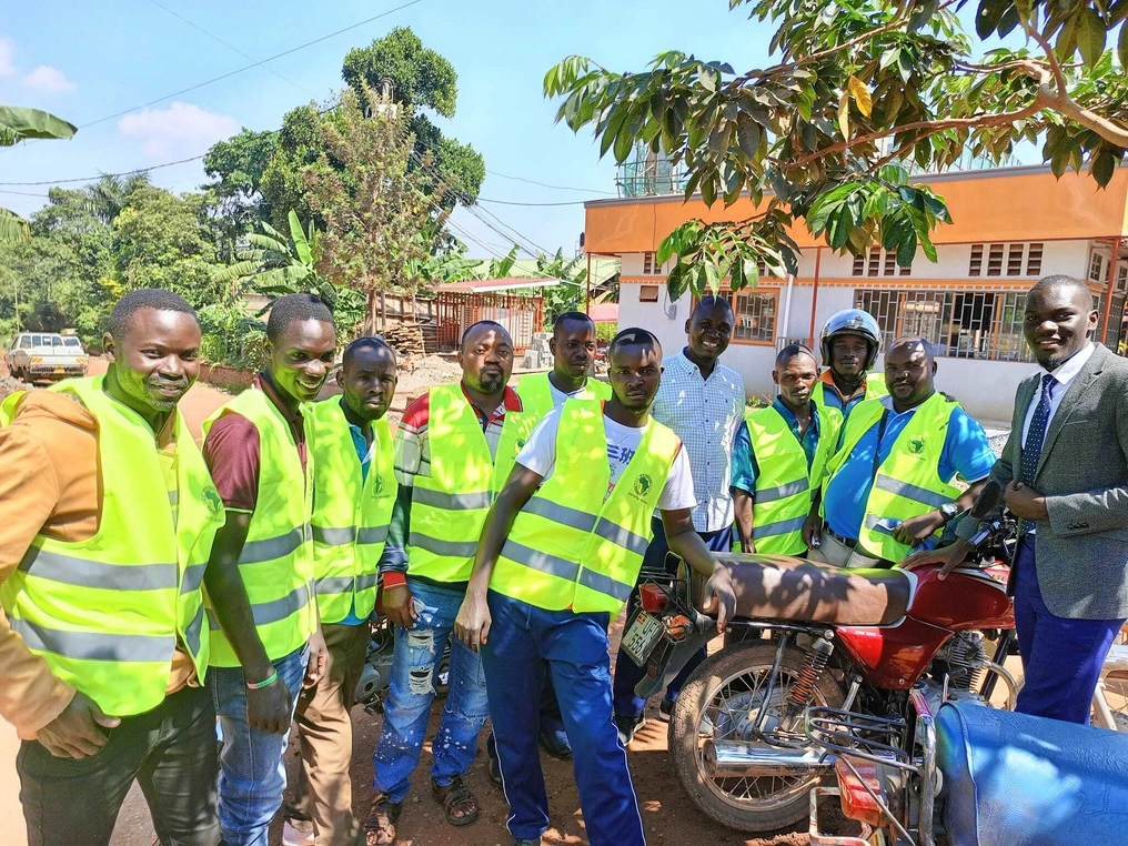 Lutakome with boda boda drivers