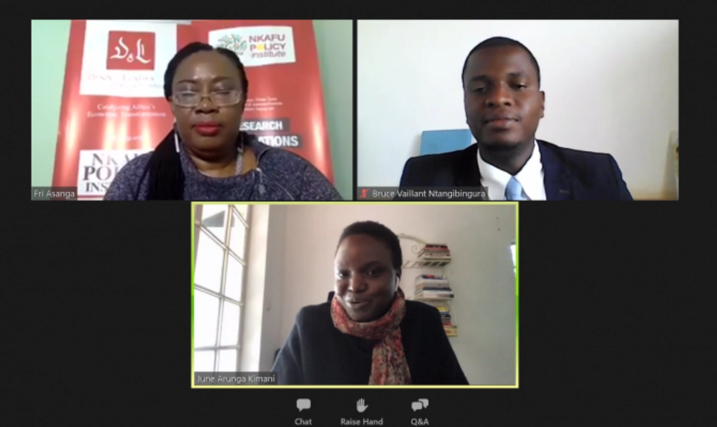 A man and two women videoconference.