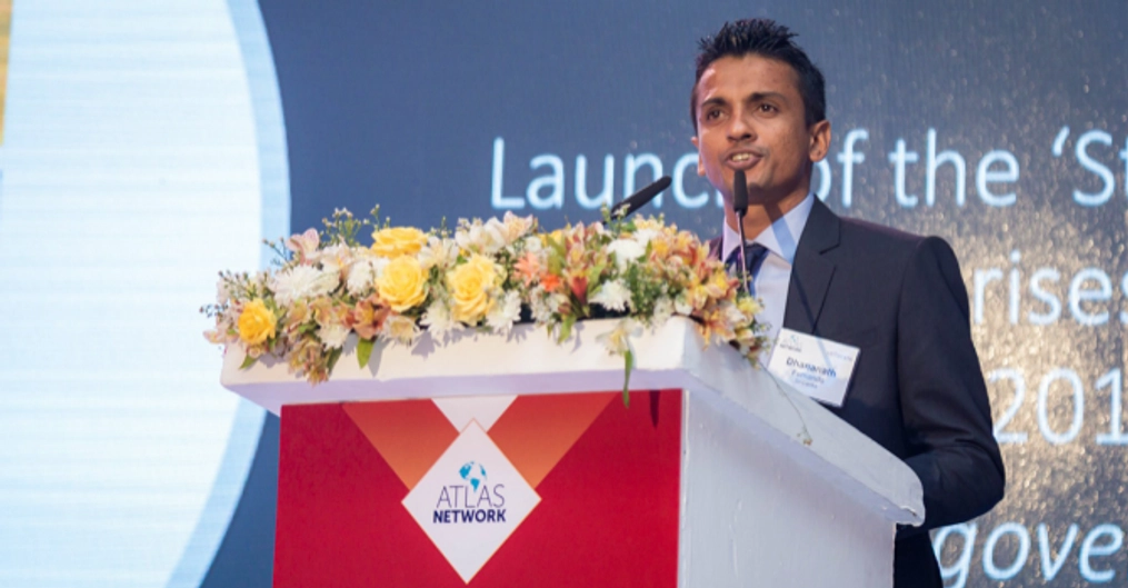 Fernando gives a speech at an Atlas Network event.