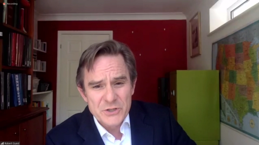 A man speaking on a video conference Lithuania.