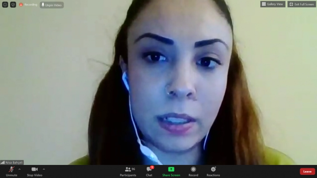 A woman in Lithuania on a video conference.